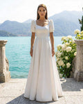 Simple and elegant wedding dress with sleeves