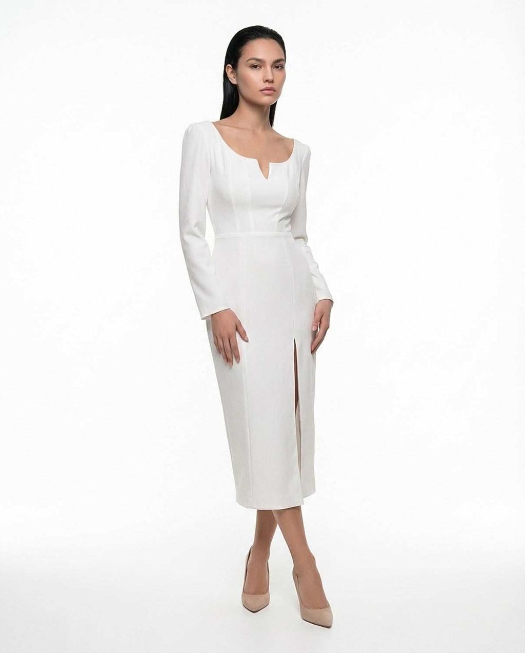 Elegant white dress with long sleeves and slit