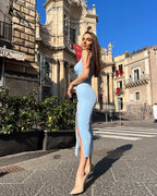 Rochie eleganta albastra cu decolteu și slit dublu, pentru evenimente speciale.