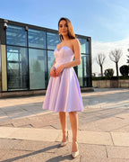 Rochie cu corset midi mov de ocazie și fustă evazată, elegantă, ideală pentru cocktail sau banchet.